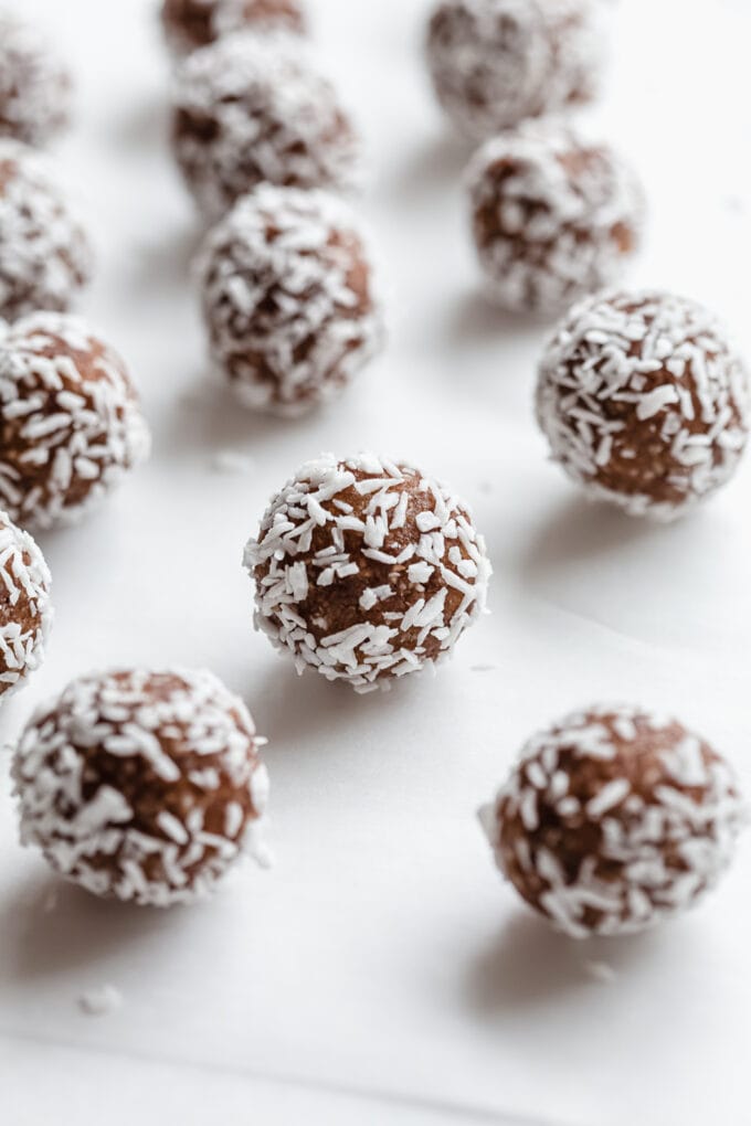 pecan pie energy balls on a sheet of parchment paper