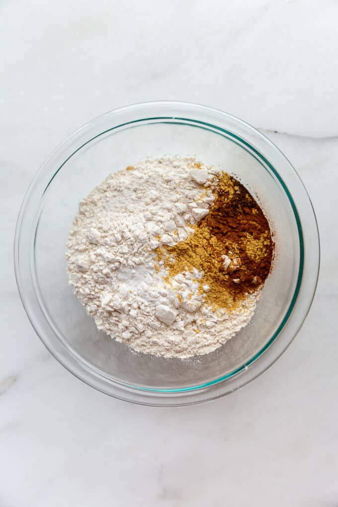flour, baking soda and spices in a mixing bowl