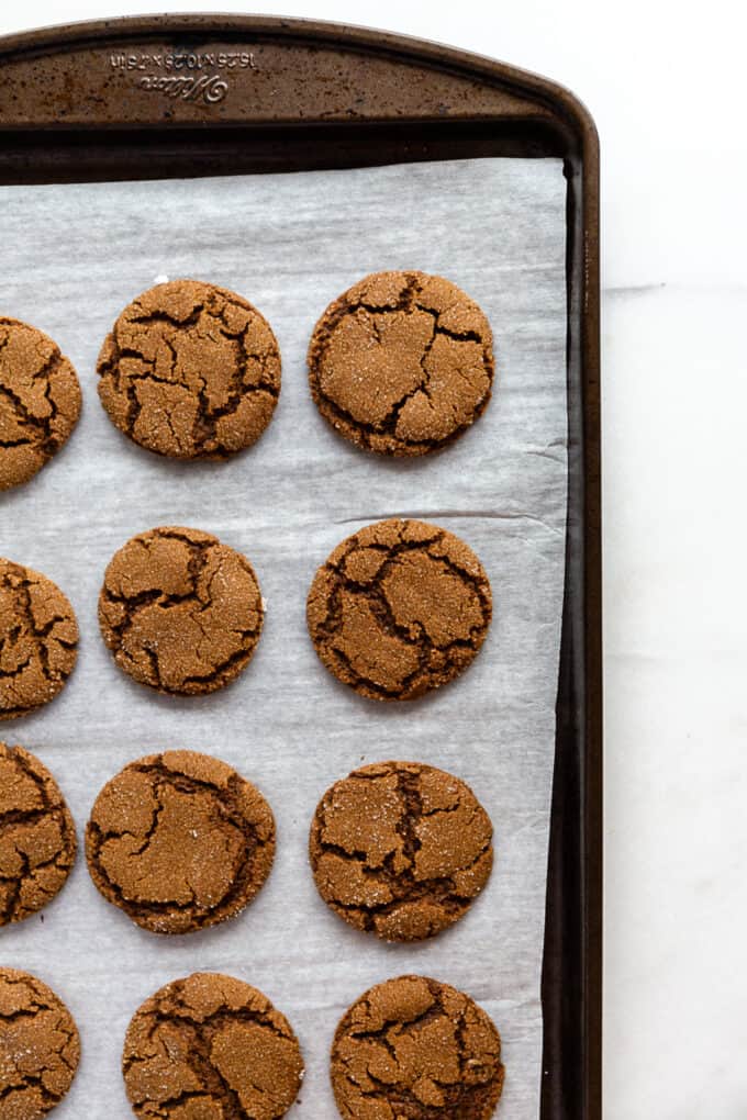 ginger molasses cookies on a baking sheet