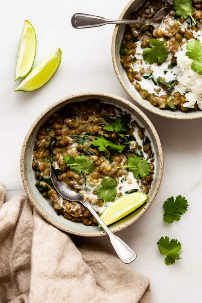 two bowls of thai green curry lentils
