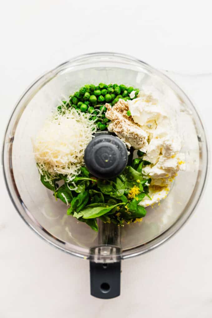 ricotta, peas, parmesan, basil and lemon zest in a food processor