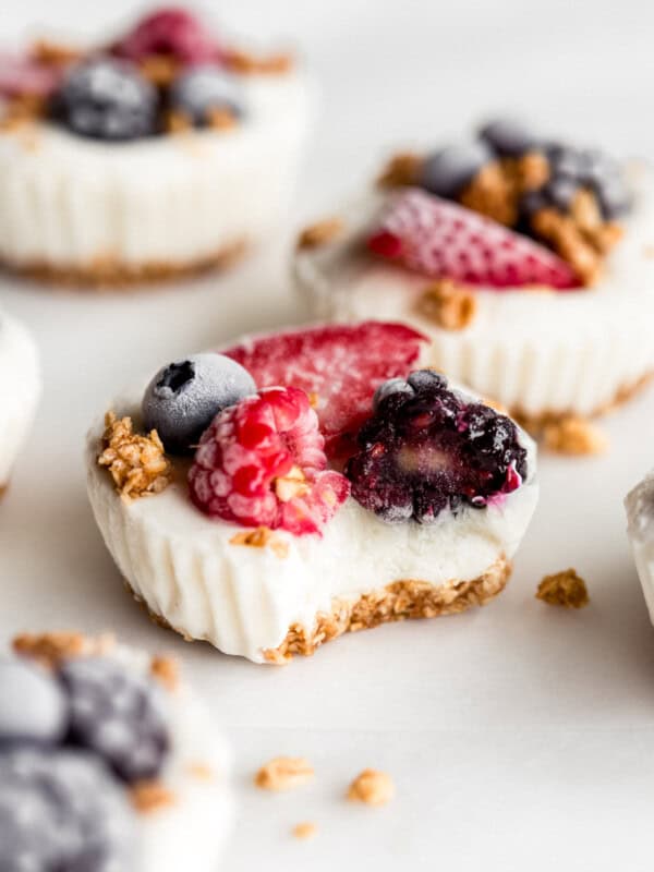 a frozen yogurt granola cup with a bite taken out of it