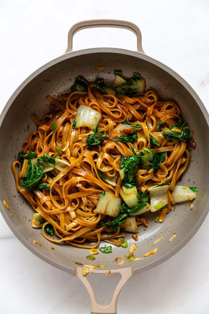 Stir-fried miso noodles in a taupe pan
