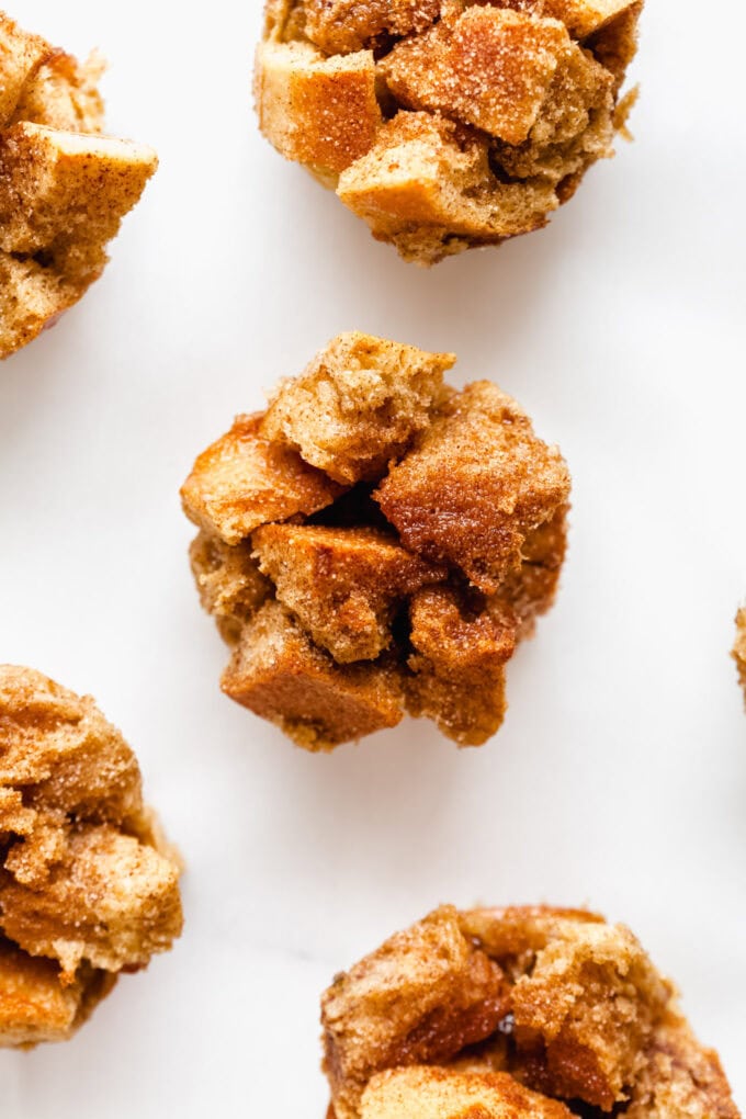 french toast muffins on a white marble board