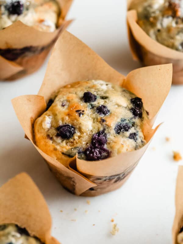 Cottage cheese Blueberry muffins in brown paper cups.