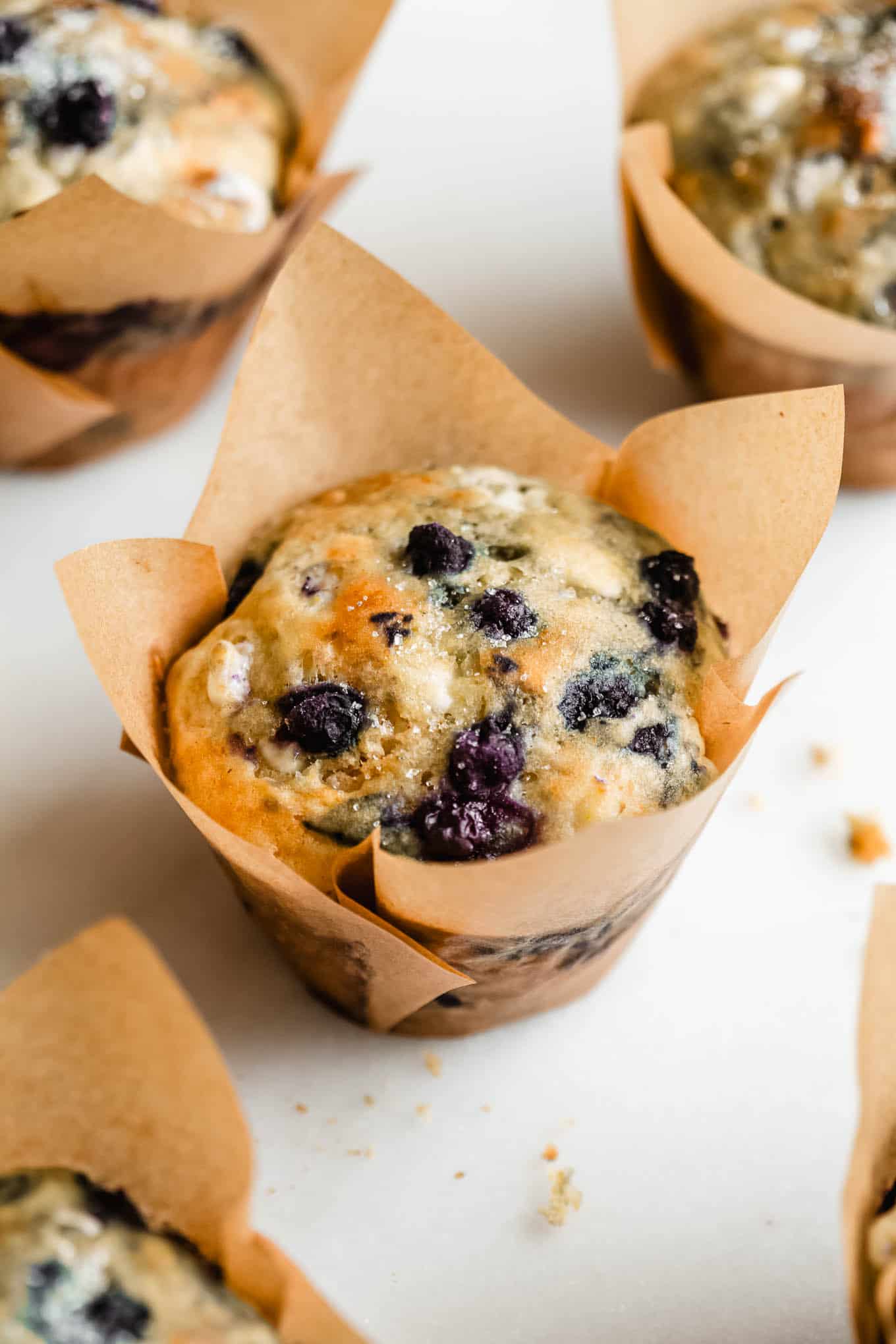 Cottage cheese Blueberry muffins in brown paper cups.