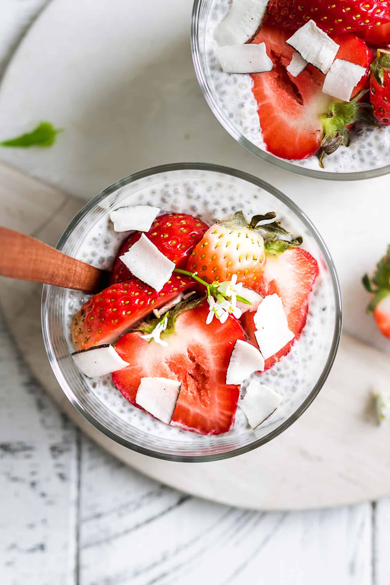 strawberries on coconut chia pudding.