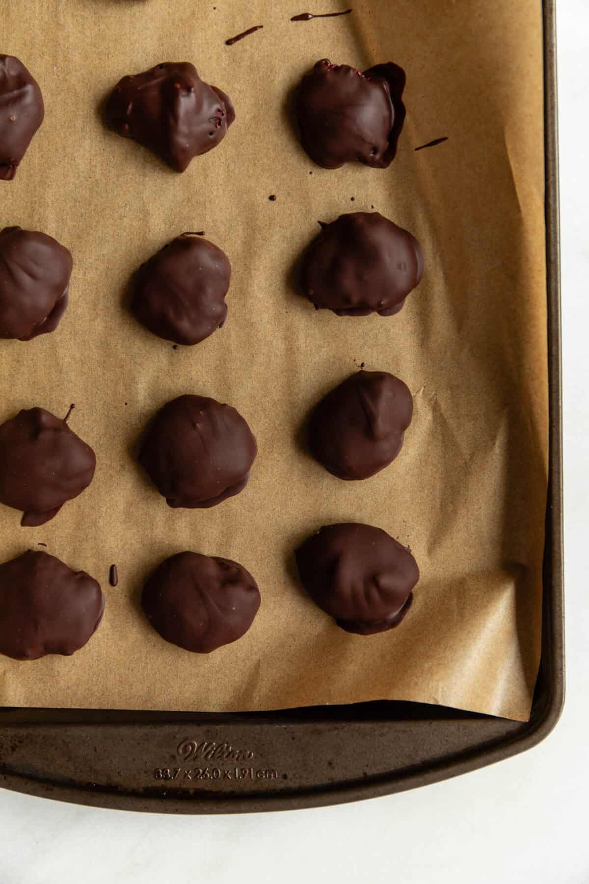A chocolate chia jam bites on a baking sheet.