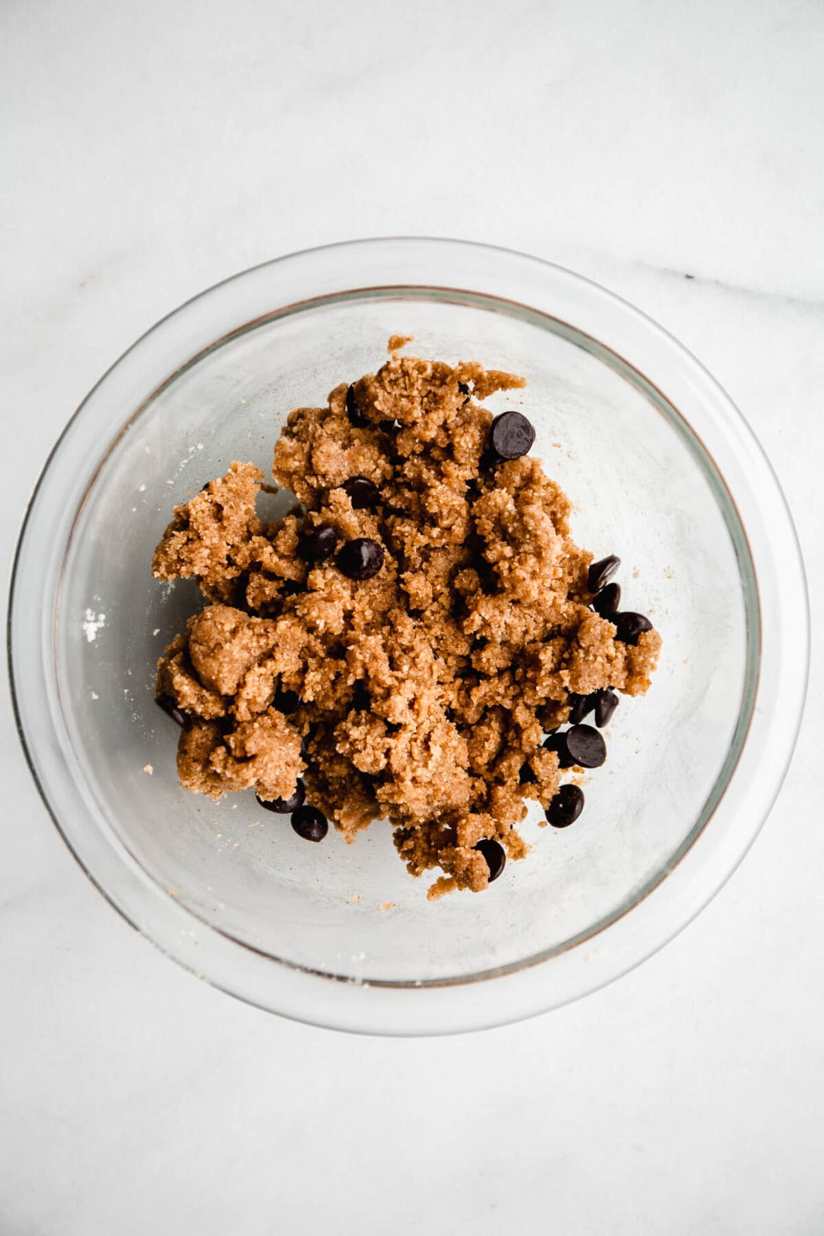 no bake cookie dough with chocolate chips in a mixing bowl.