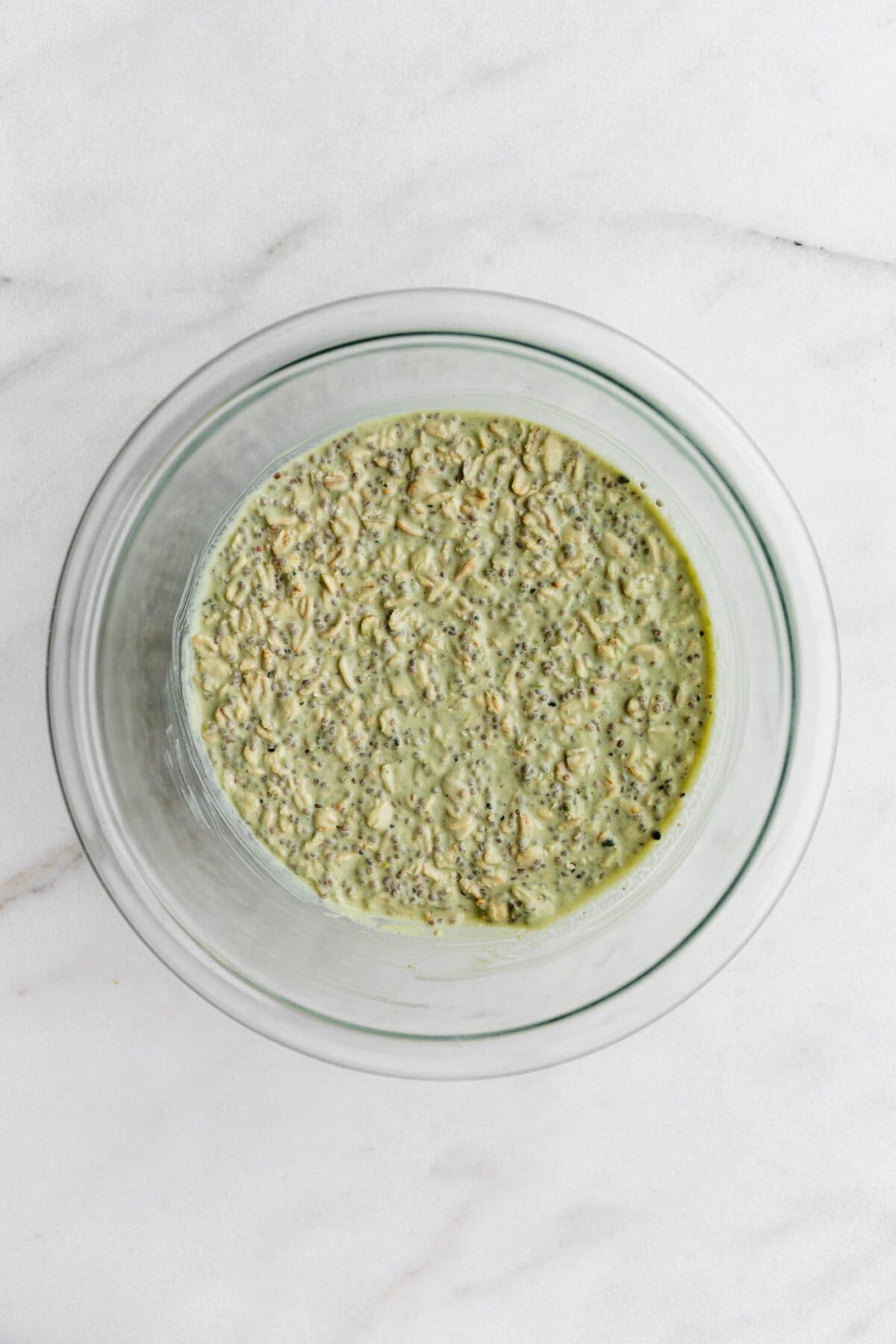 Key lime overnight oats in a clear bowl.