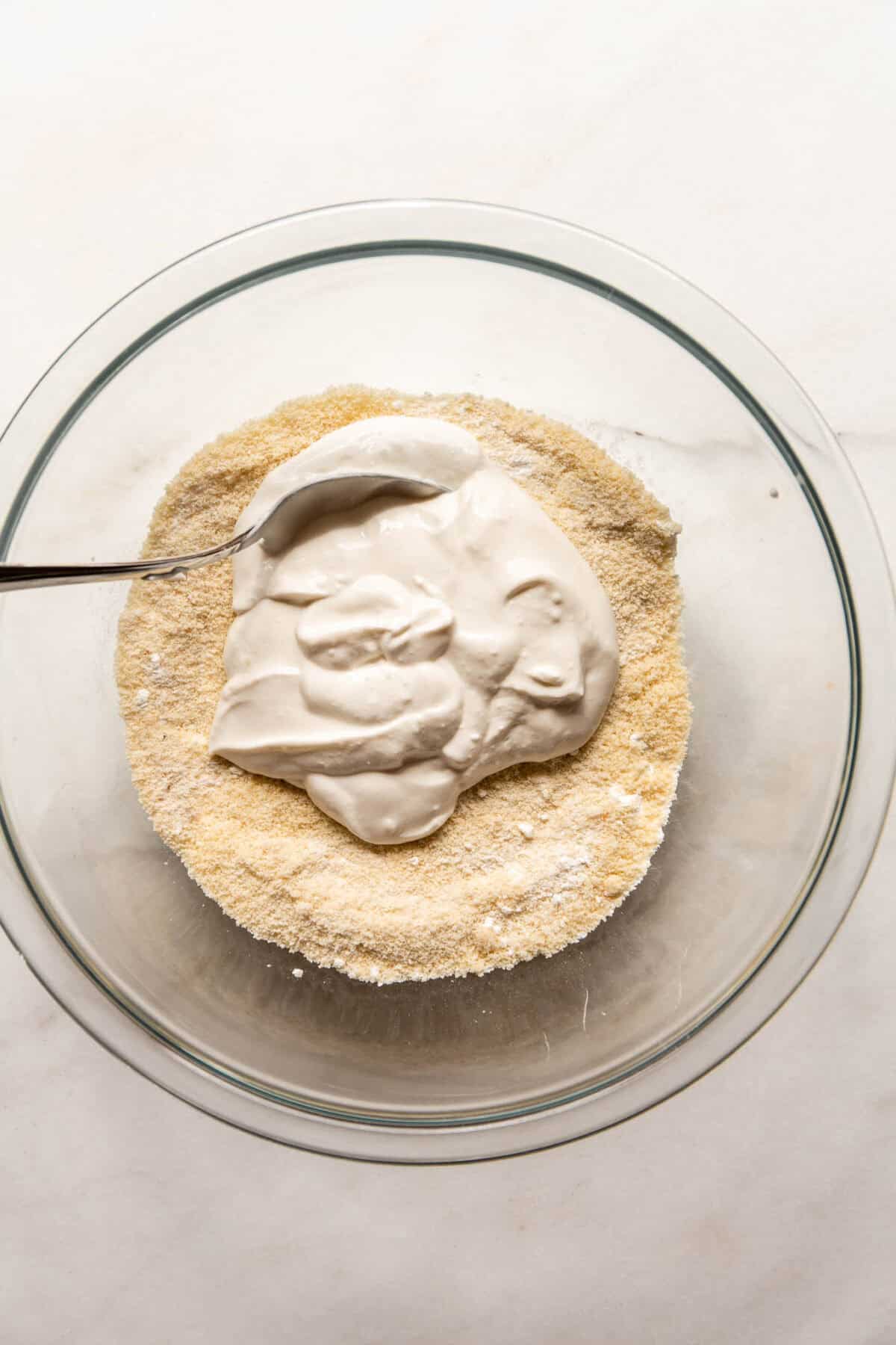 almond flour, cornstarch and blended cottage cheese in a clear mixing bowl.