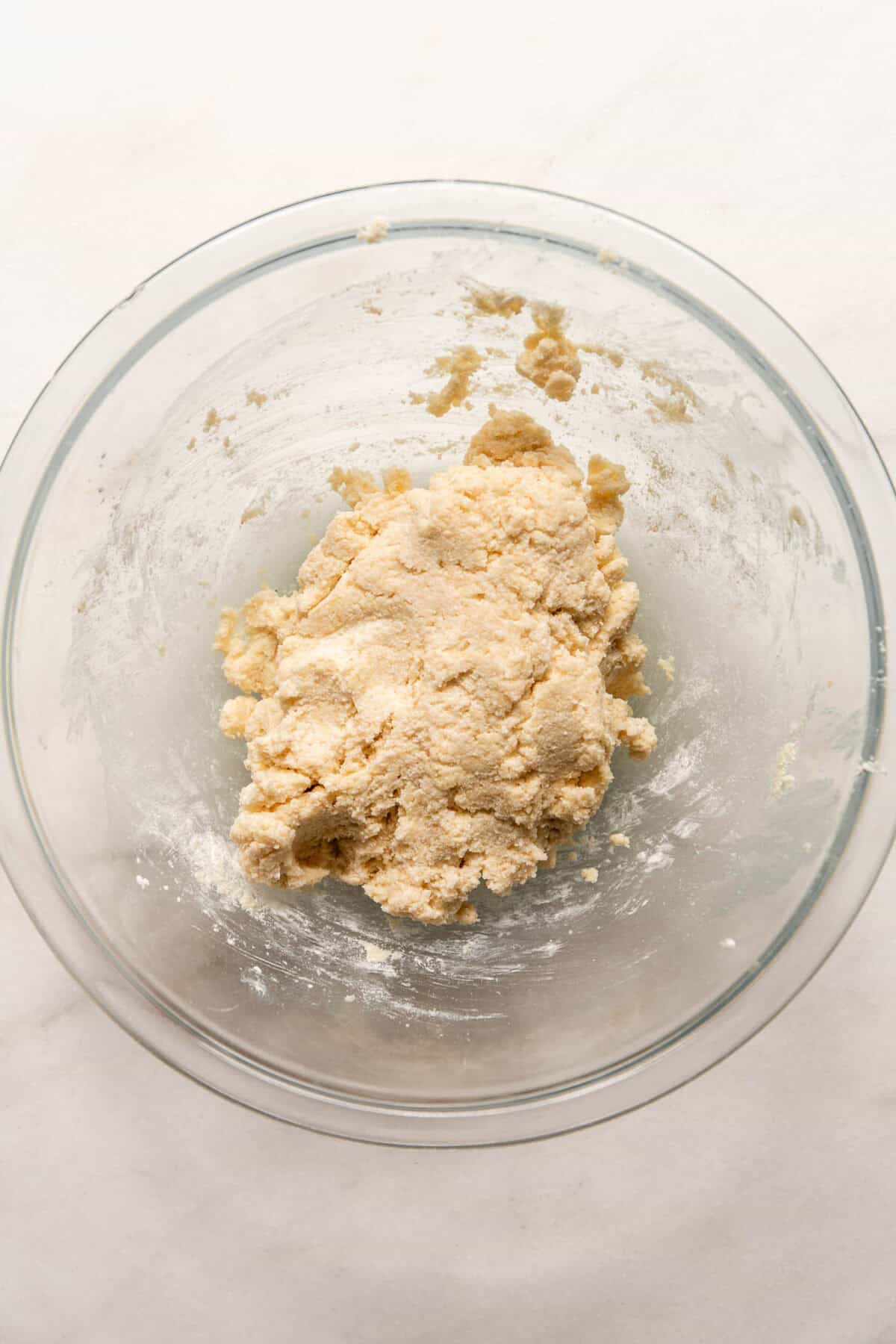Cottage Cheese Almond Flour Bagel dough in a clear mixing bowl.