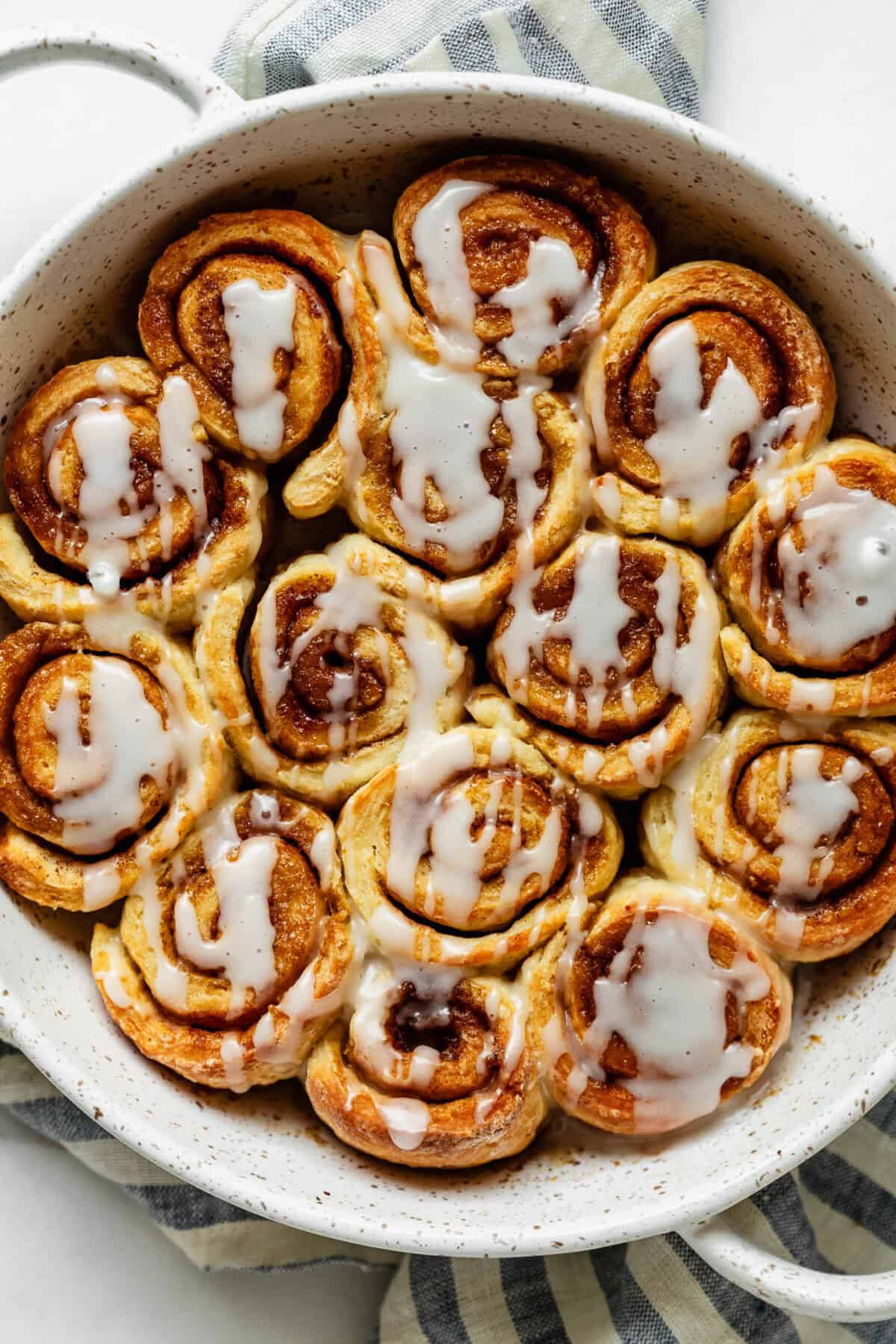 Overhead view of glazed cottage cheese cinnamon rolls with cream cheese icing.