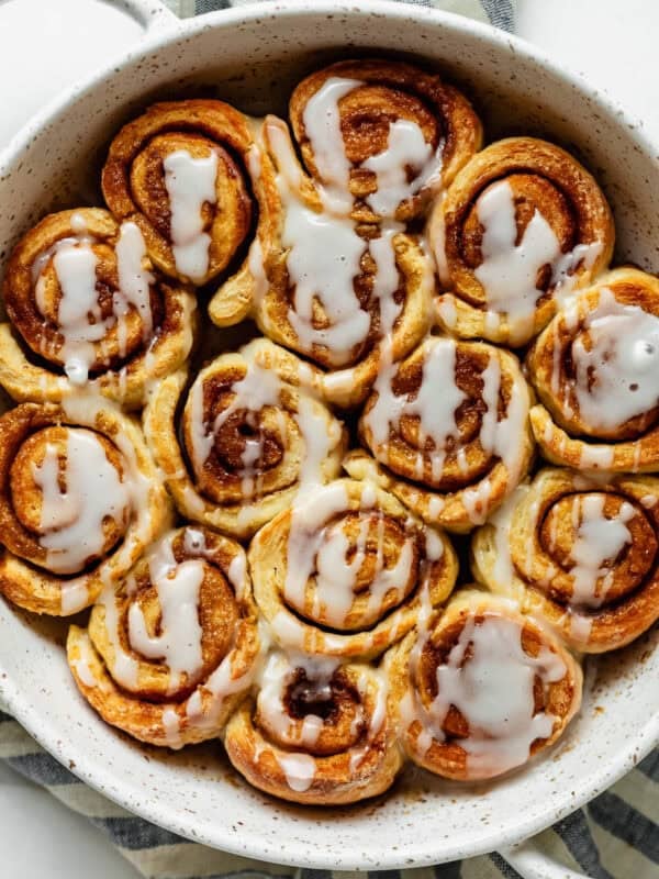 Overhead view of glazed cottage cheese cinnamon rolls with cream cheese icing.