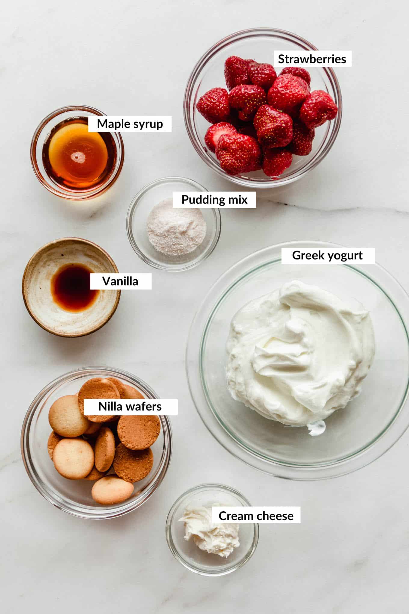 Ingredients for strawberry cheesecake pudding jars.
