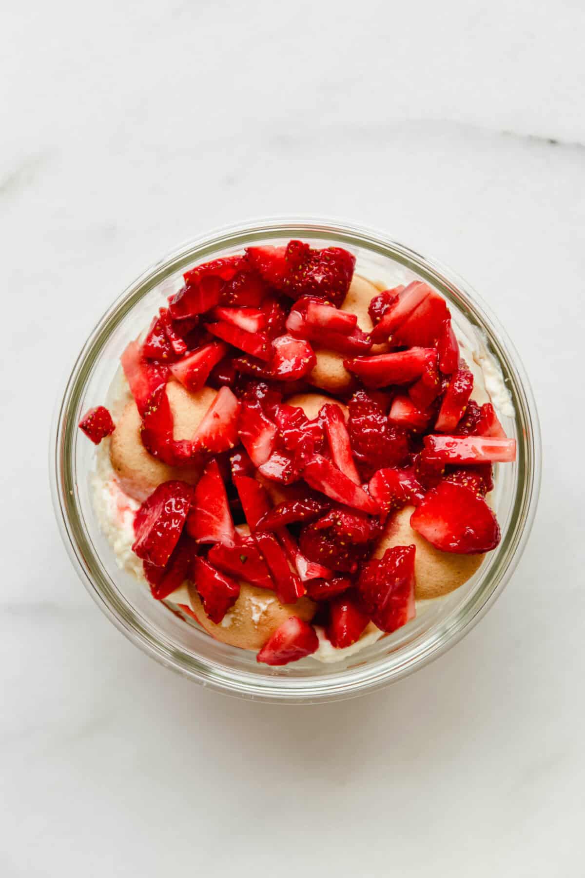 chopped strawberries layered on nilla wafers and greek yogurt pudding mix.