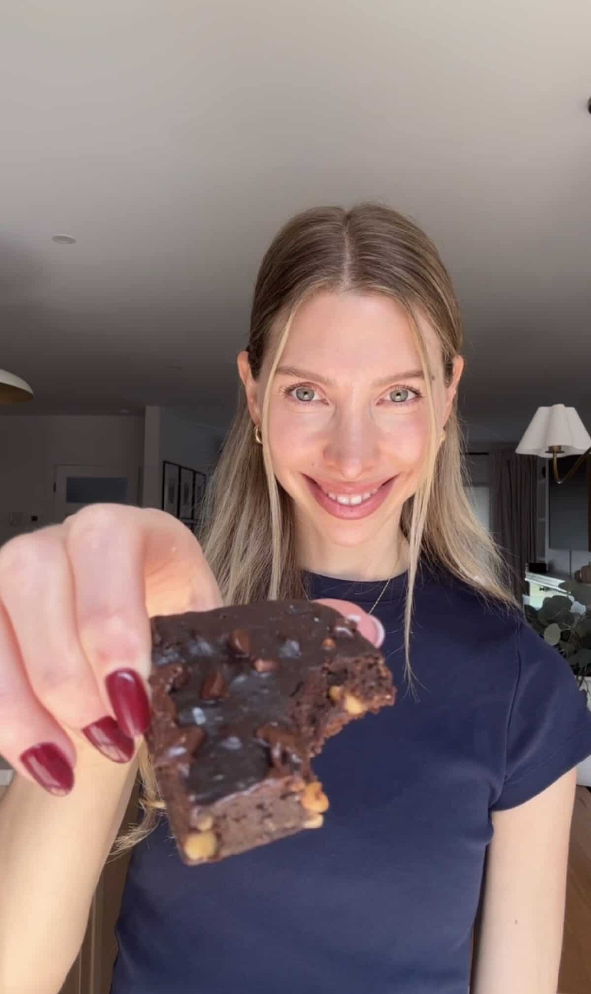 Jess holding a banana brownie.